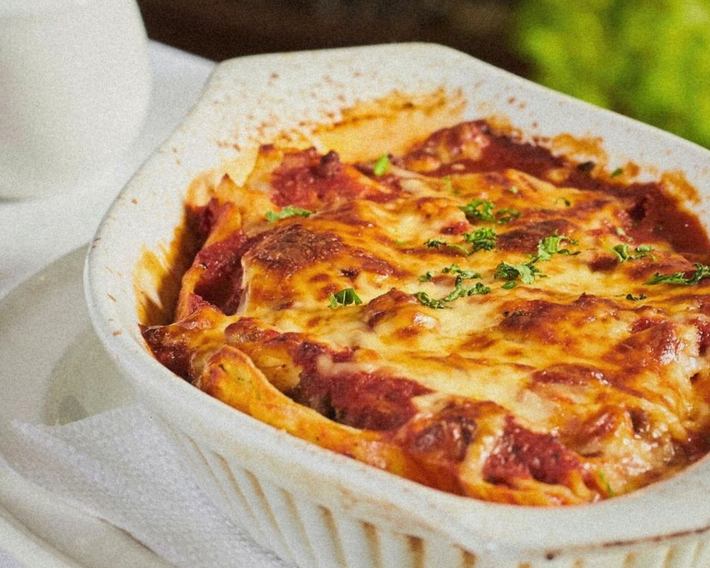 Capri lasagna baked with tomato sauce and mozzarella