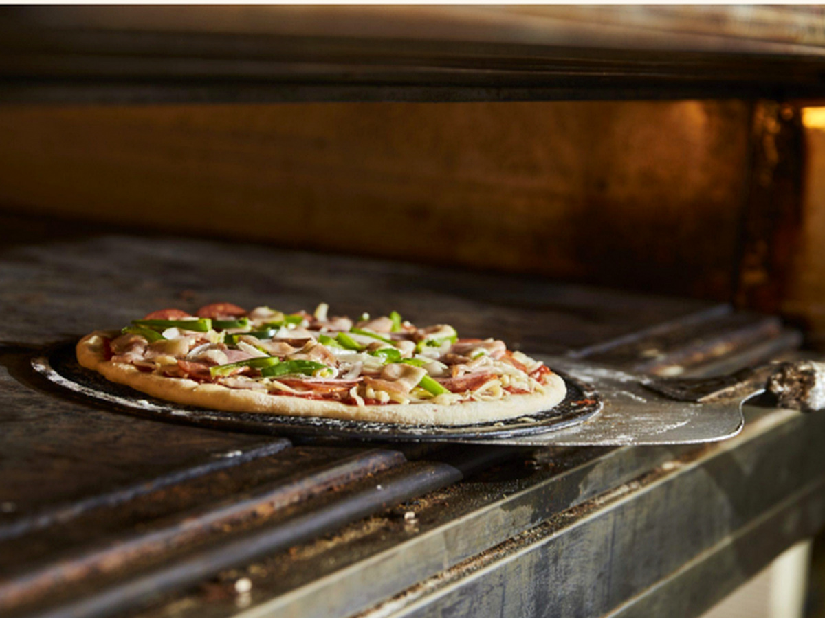 Pizza baking in the Capri oven
